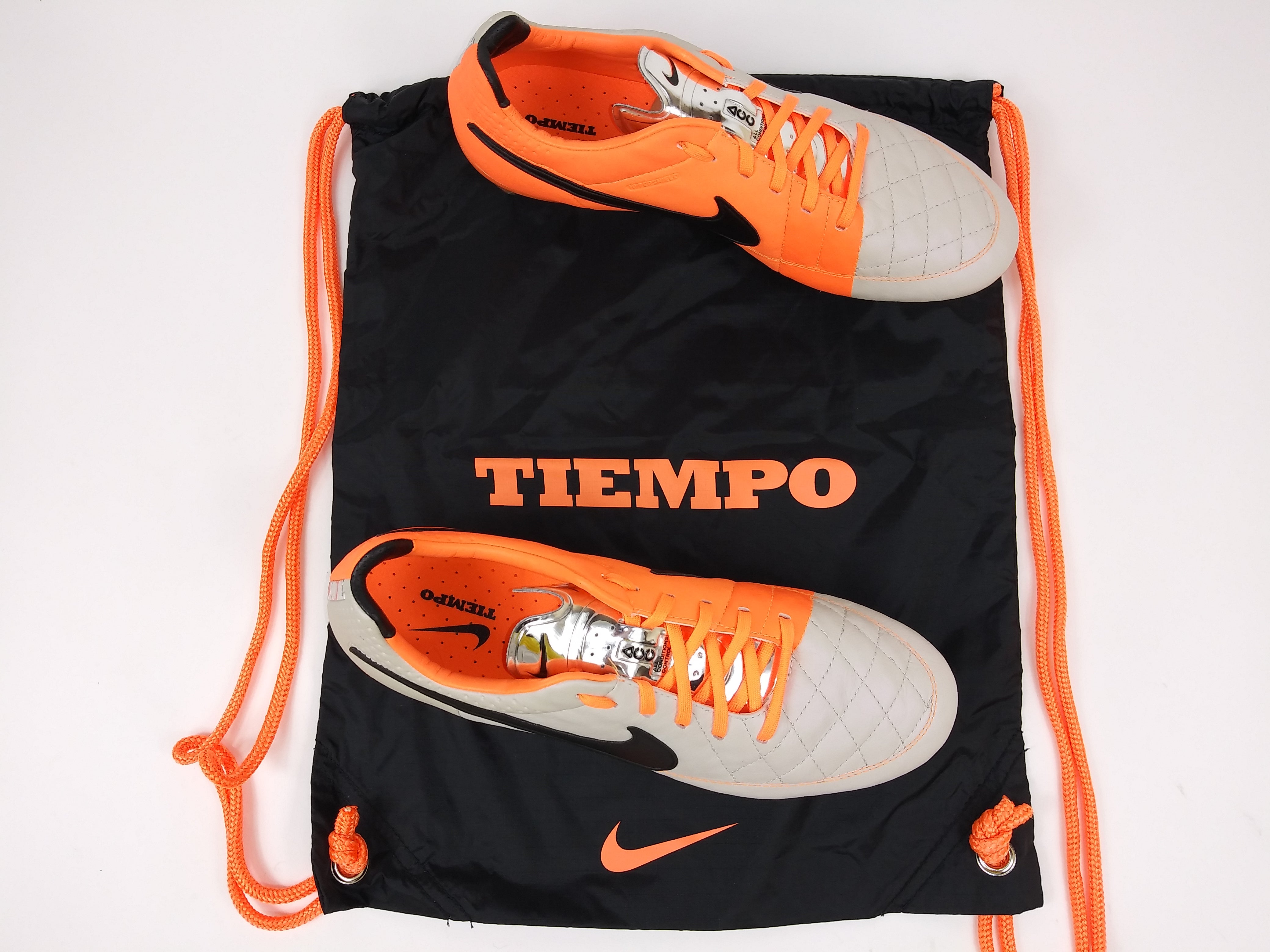 Nike tiempo orange outlet and white