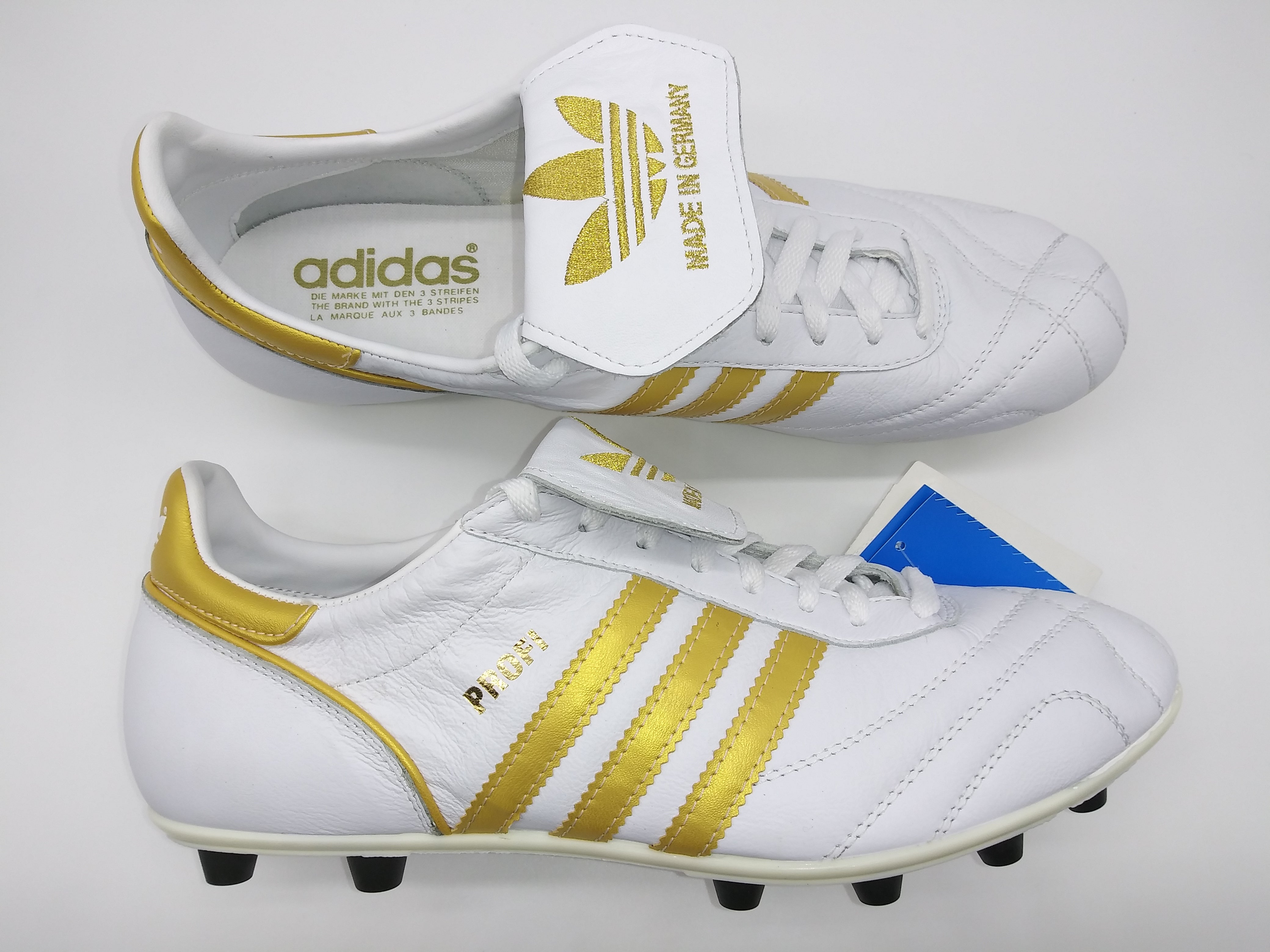 White adidas with outlet gold