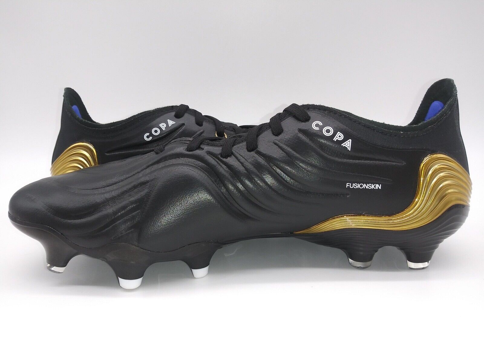 Adidas copa hotsell black and gold